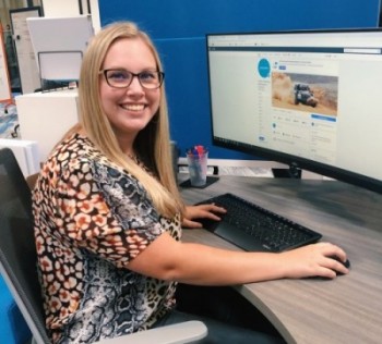 Optimized-Caroline at desk cropped
