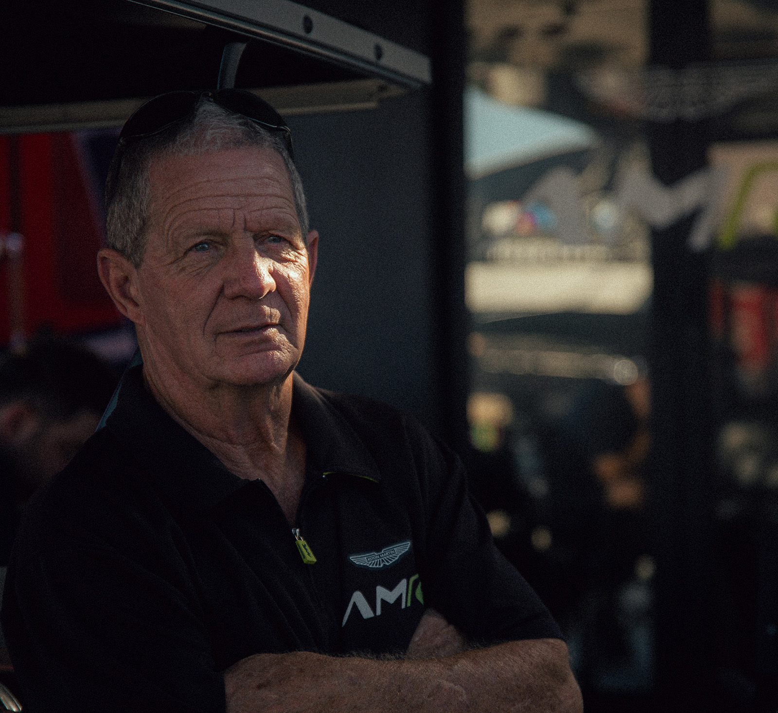 Photo of a JACKSON associate at the race track in front of a semi trailer